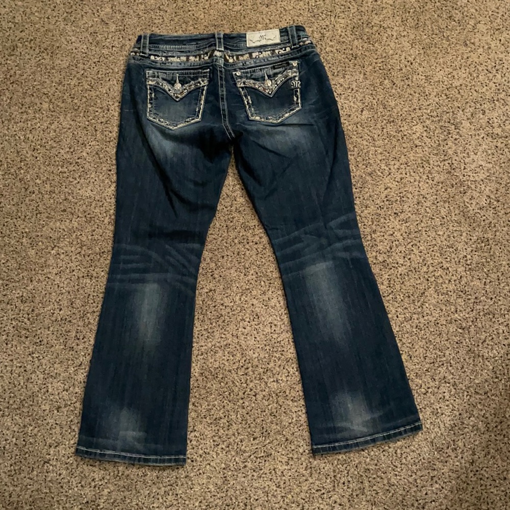 EUC Women’s Miss Me mid-rise boot cut jeans 30.
